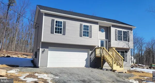 a view of a house with a snow