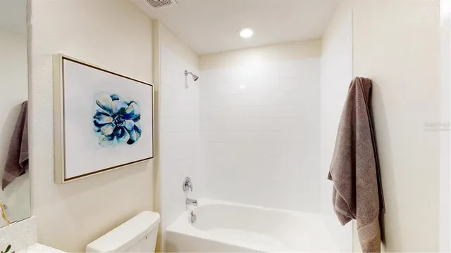 a view of a bathtub in a bathroom