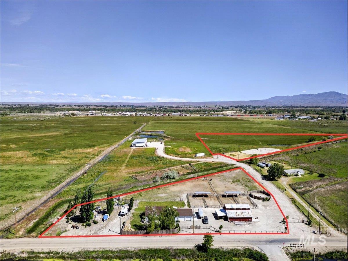 2588 West Sales Yard Road Emmett, ID 83617 - Photo 10 of 49 Expansive rural property featuring multiple outbuildings, fenced enclosures, and substantial acreage
