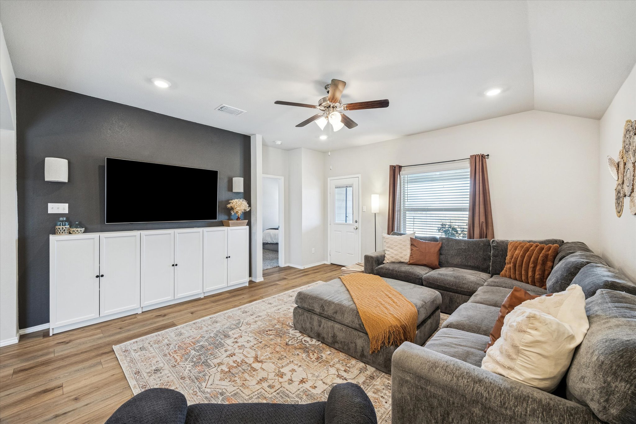 8902 Alabama Avenue Temple, TX 76502 - Photo 14 of 37 a living room with furniture and a flat screen tv