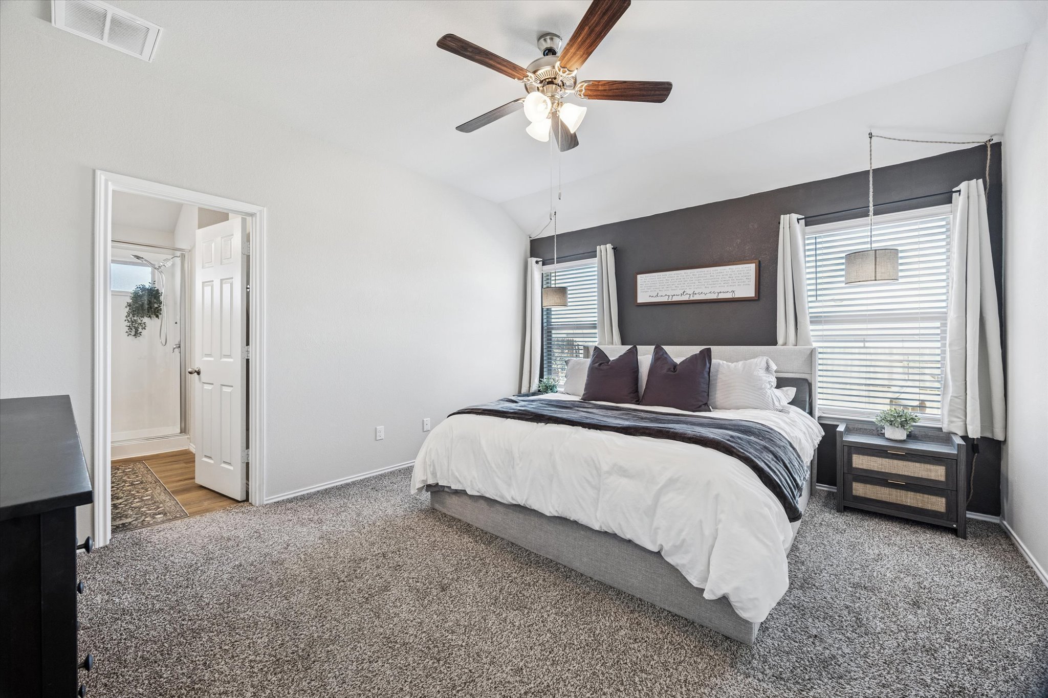 8902 Alabama Avenue Temple, TX 76502 - Photo 17 of 37 a bedroom with a bed and a ceiling fan