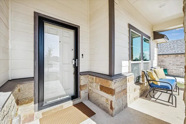 a view of an entryway with a front door