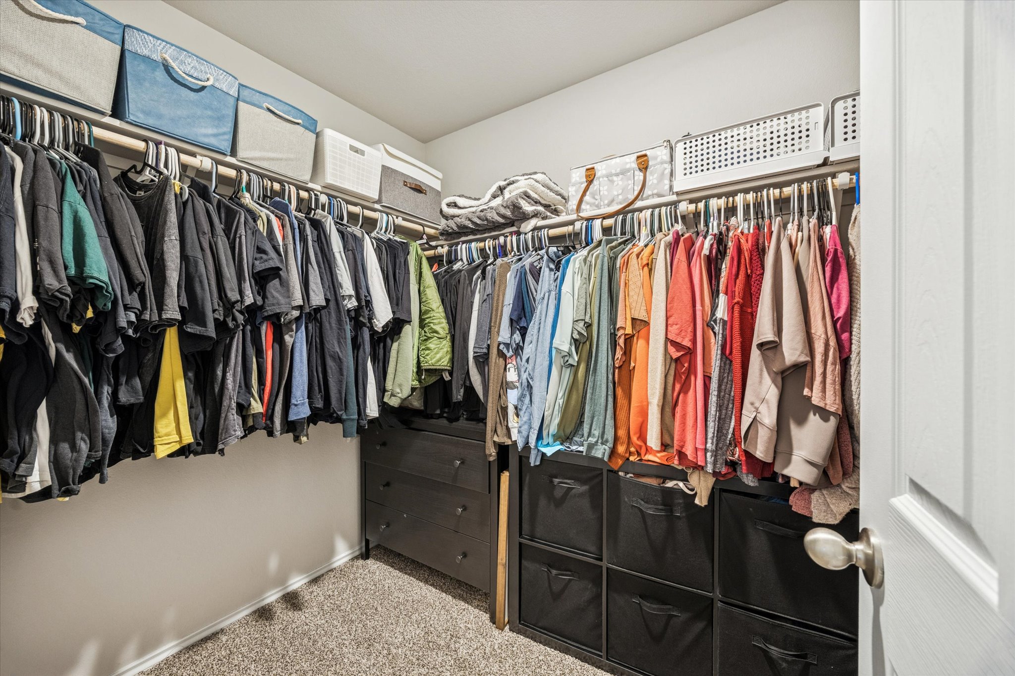 8902 Alabama Avenue Temple, TX 76502 - Photo 20 of 37 a view of walk in closet with clothes