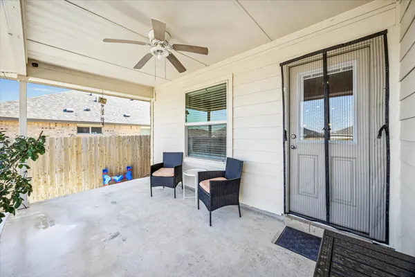 a bathroom with a double vanity sink toilet and mirror