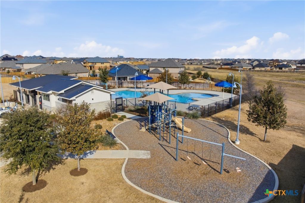8902 Alabama Avenue Temple, TX 76502 - Photo 29 of 37 an aerial view of a house with outdoor space and lake view in back