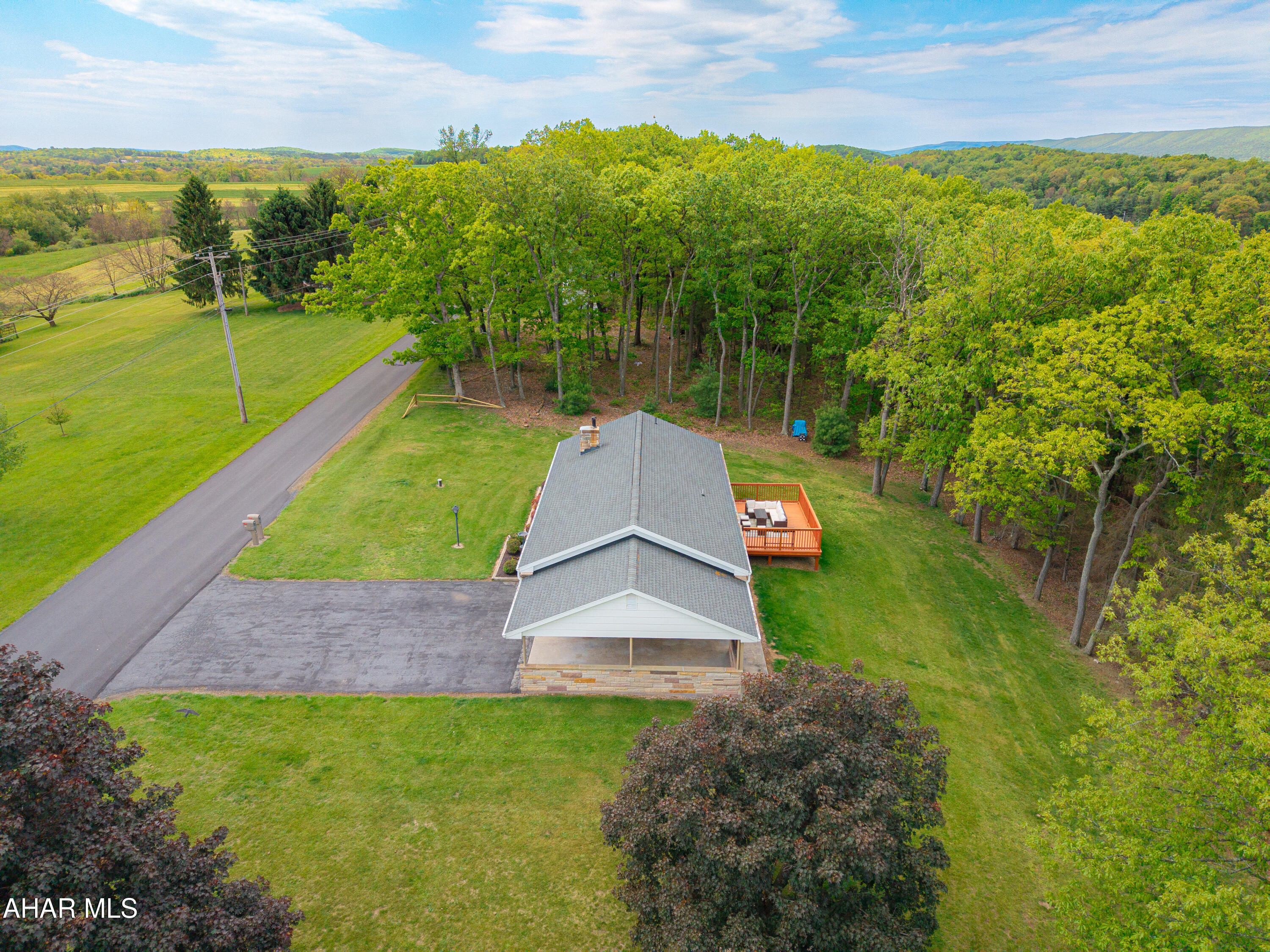 473 Calhoun Road Everett, PA 15537 - Photo 5 of 45 a view of a yard with an outdoor space