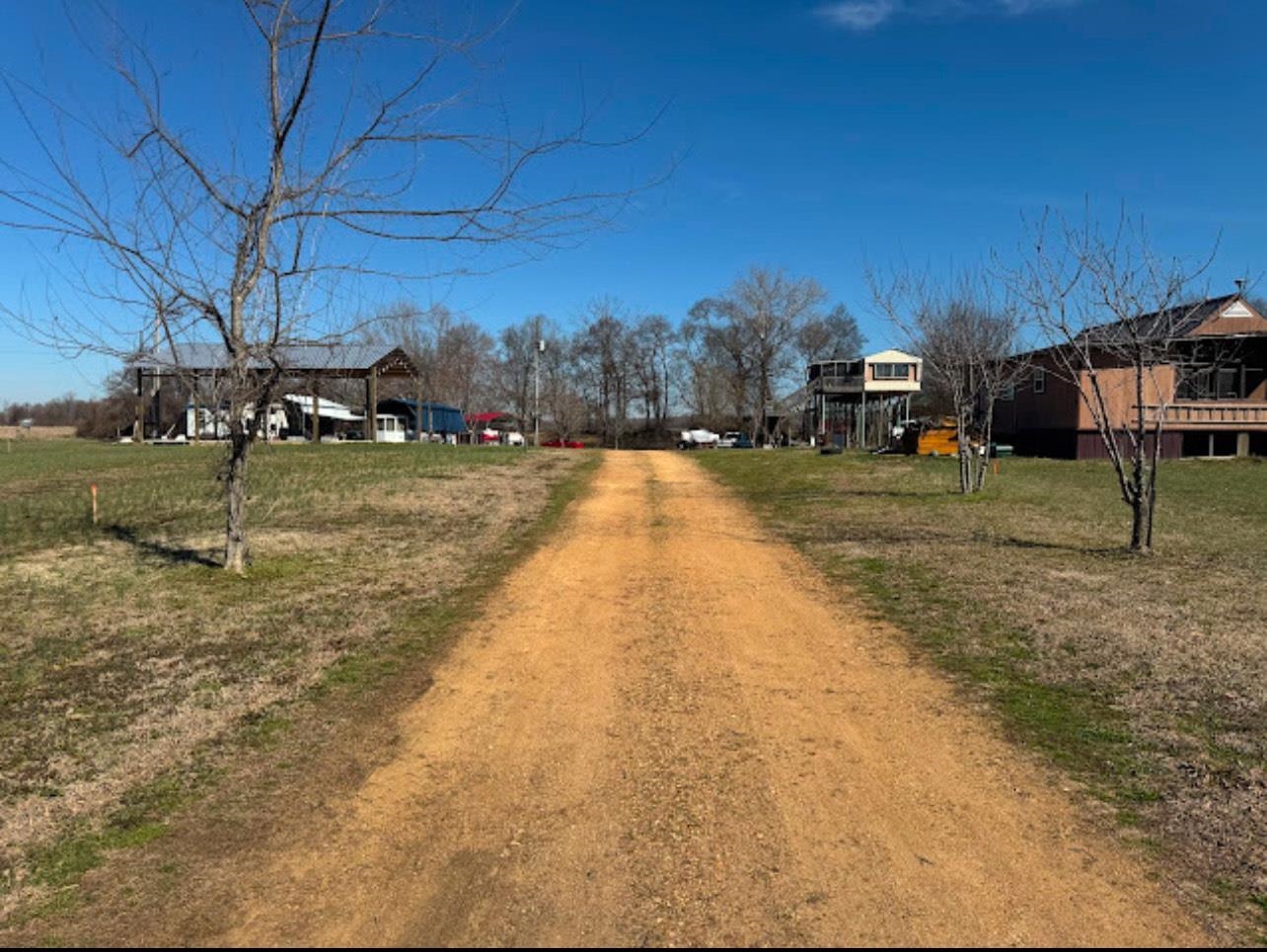 0 Arnold Lane Savannah, TN 38372 - Photo 8 of 8 a view of a yard with wooden fence