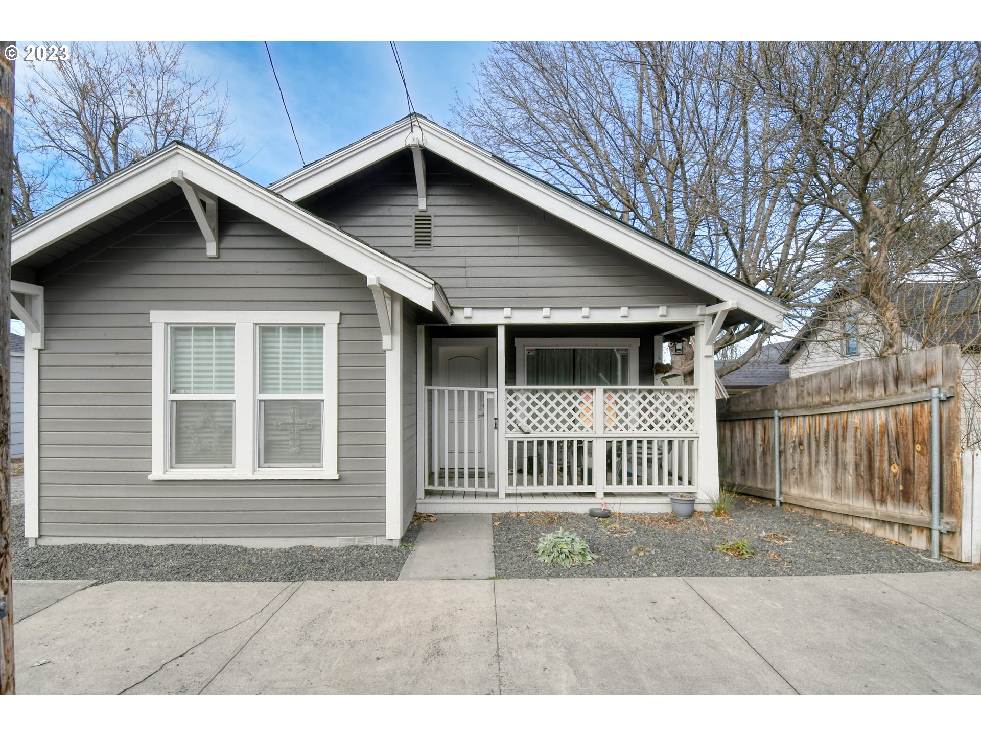 207 Southwest Isaac Avenue Pendleton, OR 97801 - Photo 1 of 32 a front view of a house with a yard