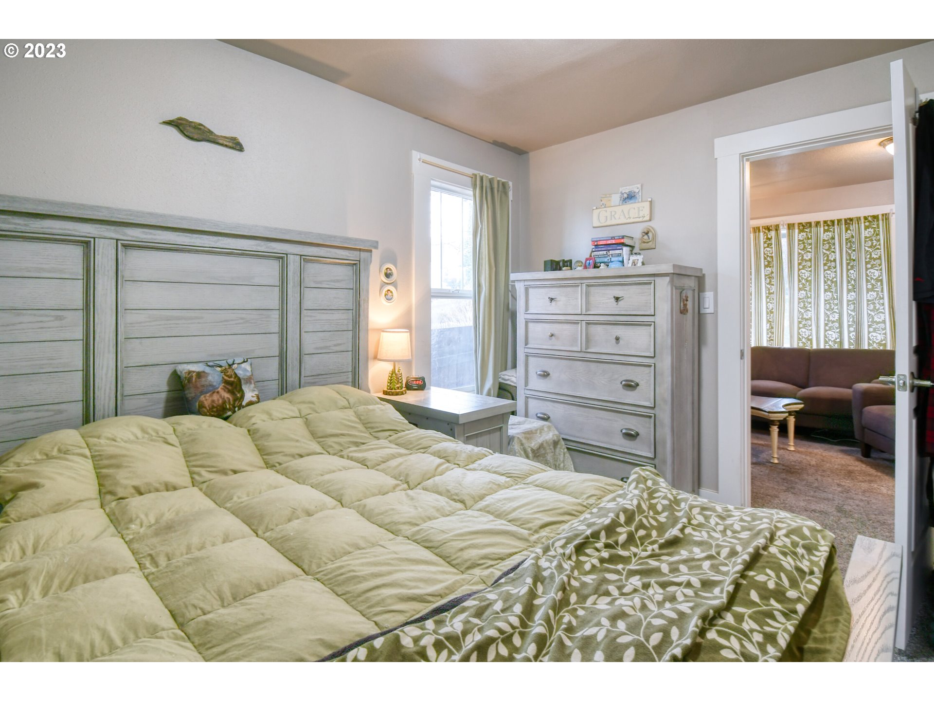 207 Southwest Isaac Avenue Pendleton, OR 97801 - Photo 20 of 32 a bedroom with a bed and a television