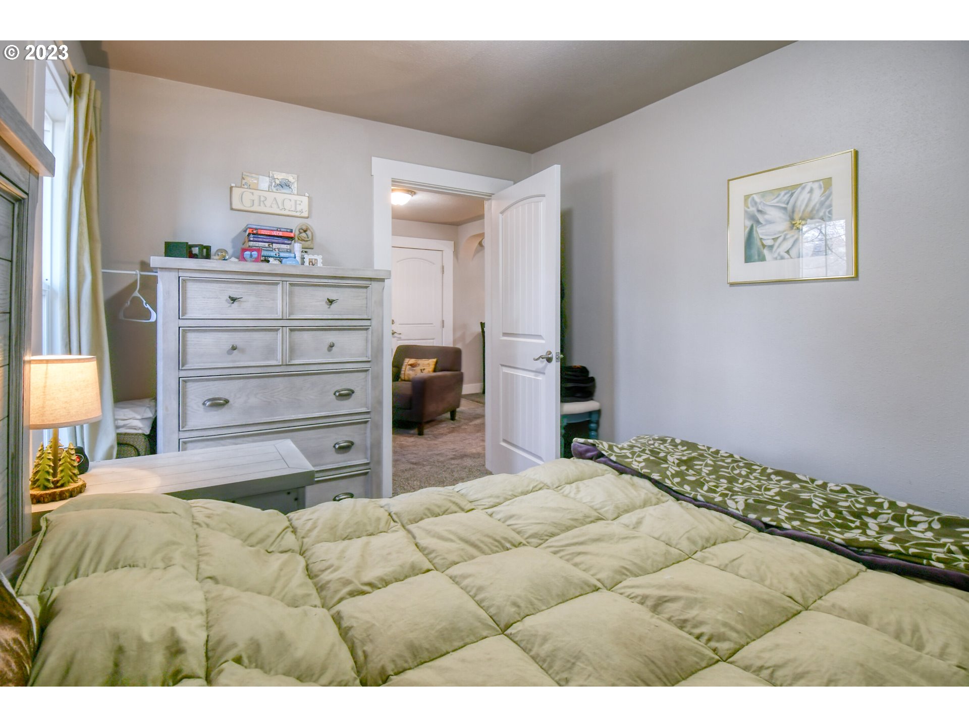 207 Southwest Isaac Avenue Pendleton, OR 97801 - Photo 21 of 32 a bedroom with a bed and a cabinets