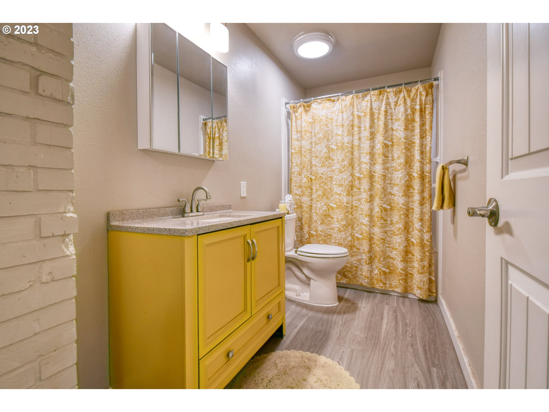 207 Southwest Isaac Avenue Pendleton, OR 97801 - Photo 23 of 32 a bathroom with a sink and a mirror