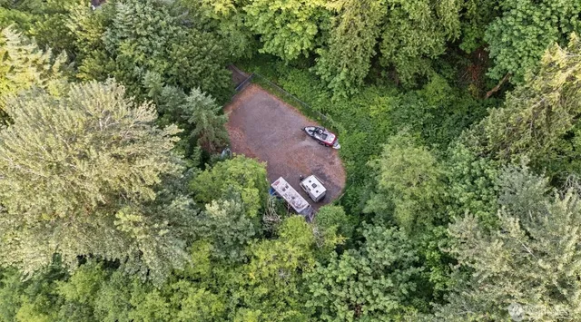 a view of a backyard of the house