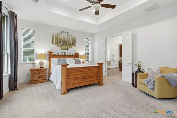 a bed room with furniture and a window