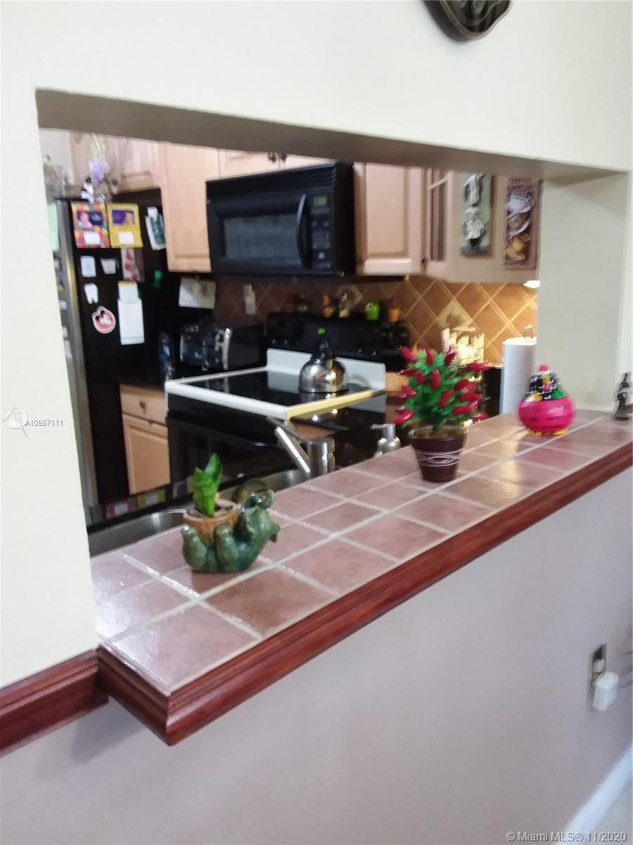 10985 Southwest 107th Street, Unit 102 Miami, FL 33176 - Photo 4 of 16