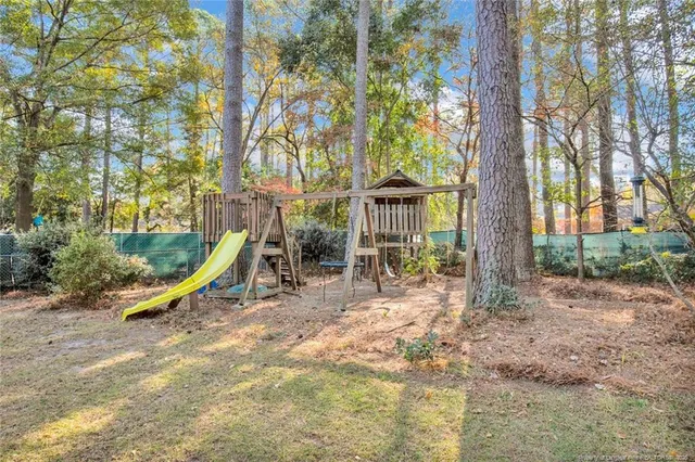 a view of a park with a slide