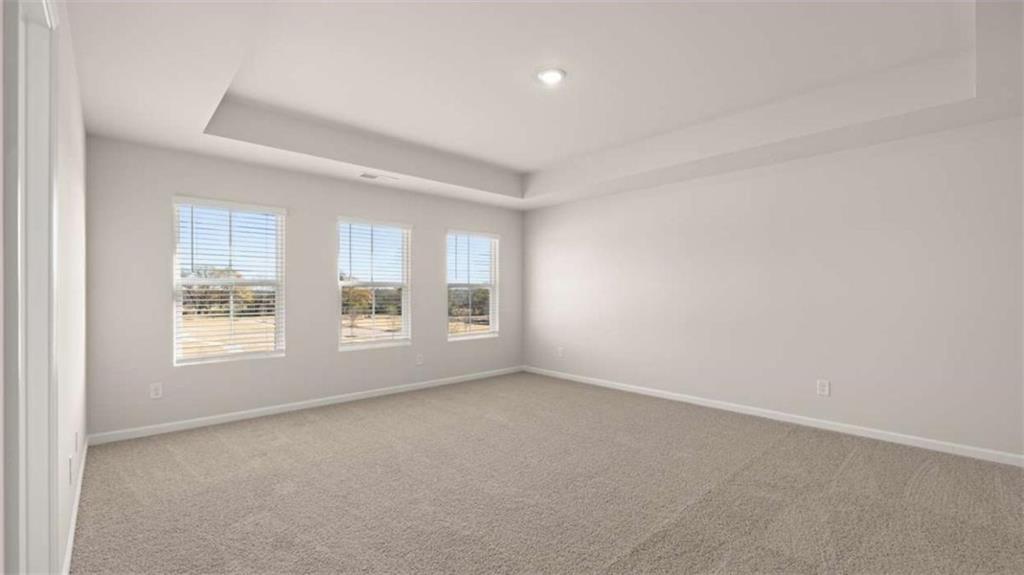 319 Tate Street Monroe, GA 30655 - Photo 22 of 33 an empty room with a window