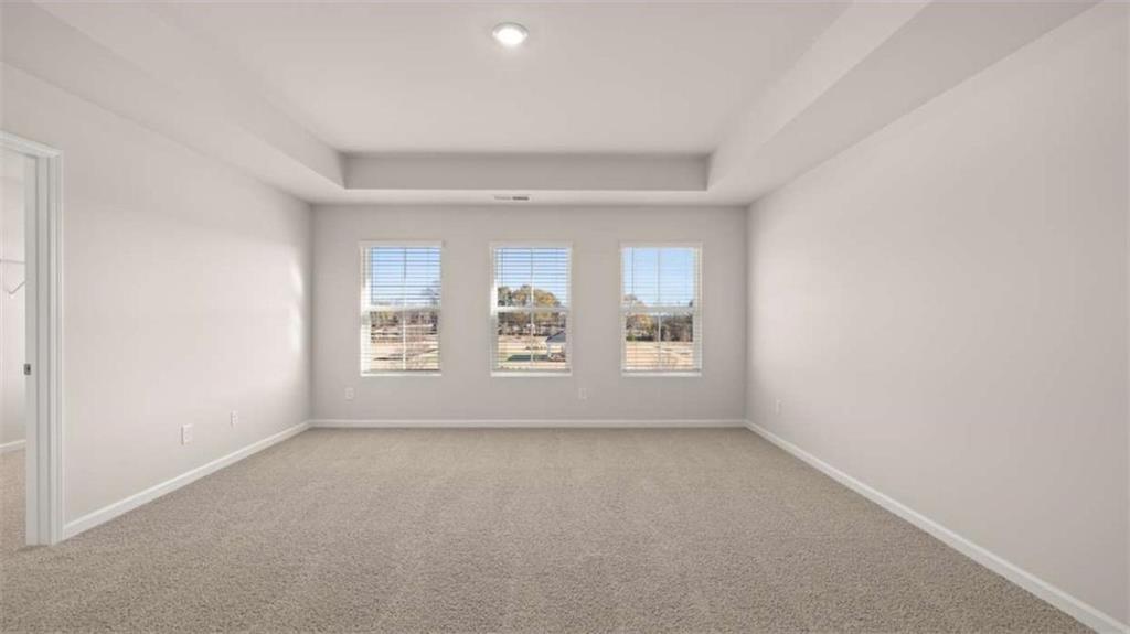 319 Tate Street Monroe, GA 30655 - Photo 23 of 33 an empty room with a window