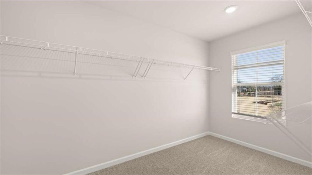 319 Tate Street Monroe, GA 30655 - Photo 25 of 33 a view of an empty room with windows