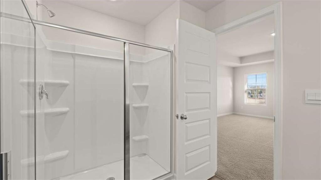 319 Tate Street Monroe, GA 30655 - Photo 28 of 33 a bathroom with a shower