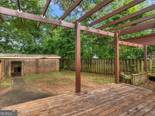 a house view with a backyard
