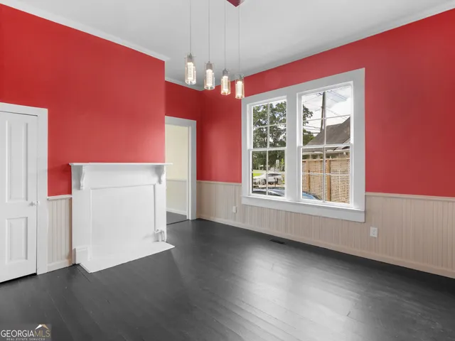 a view of livingroom with furniture wooden floor and window