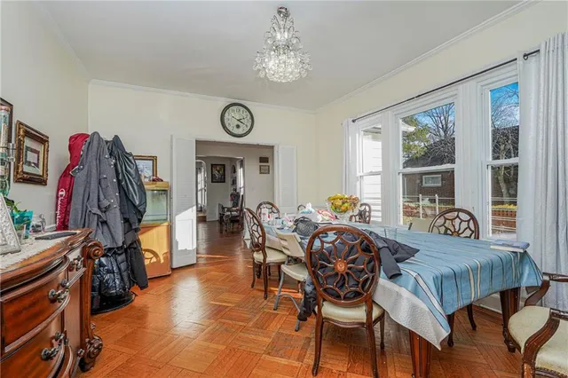 a view of a dining room with furniture window and outside view