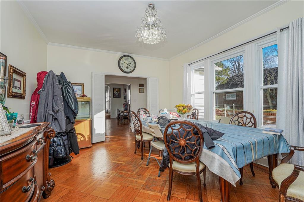 1764 East 24th Street Brooklyn, NY 11229 - Photo 5 of 16 a view of a dining room with furniture window and outside view