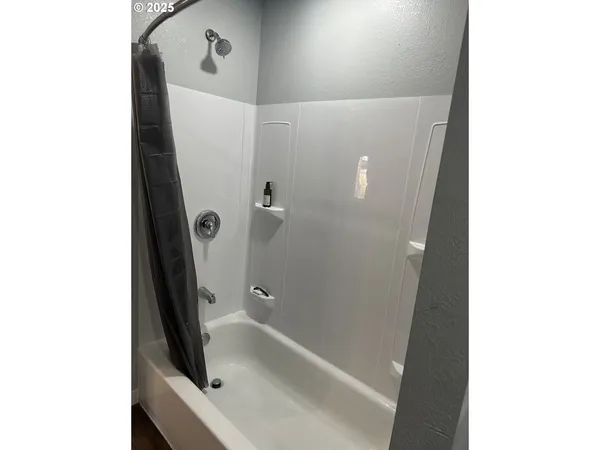 a bathroom with a bathtub