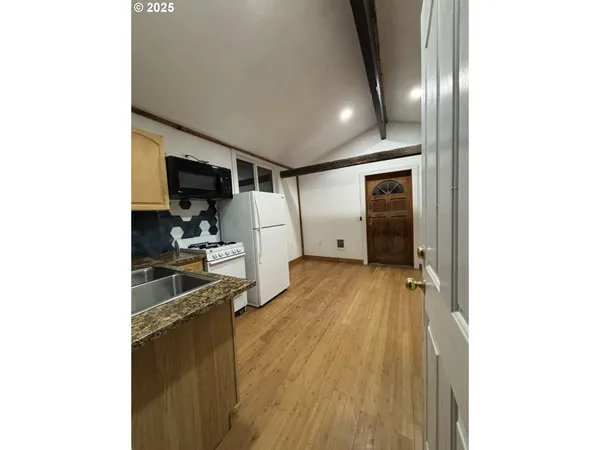 a view of a livingroom with an empty space