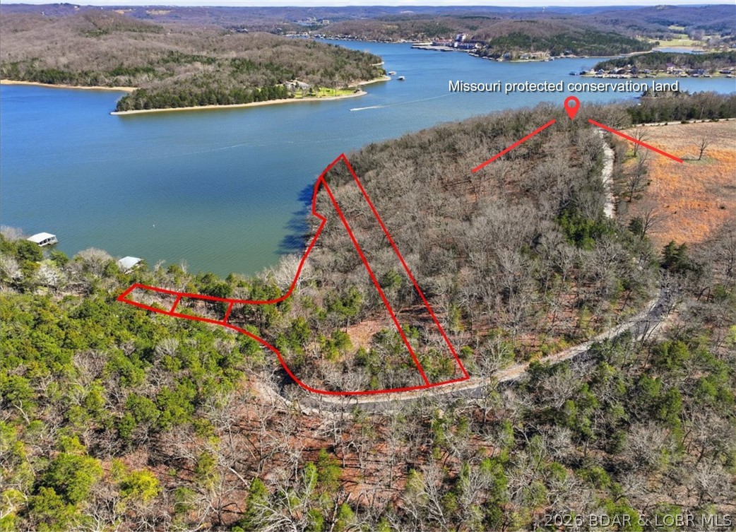 8-9 10 Starling Spring Road Roach, MO 65787 - Photo 3 of 26 The property borders protected conservation, preve