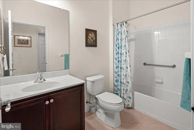 a view of a chair and table in the garden