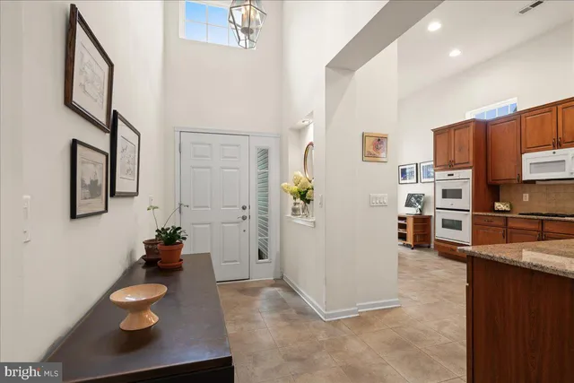 a room with furniture and a view of living room