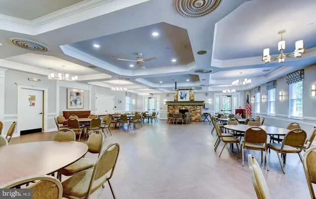 a view of a swimming pool with a yard