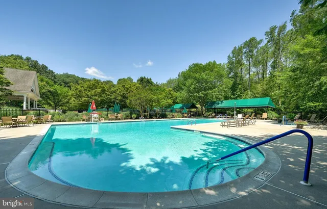 a view of an outdoor space and tennis court