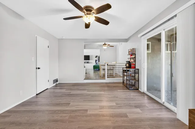 a bathroom with a sink a mirror and shower