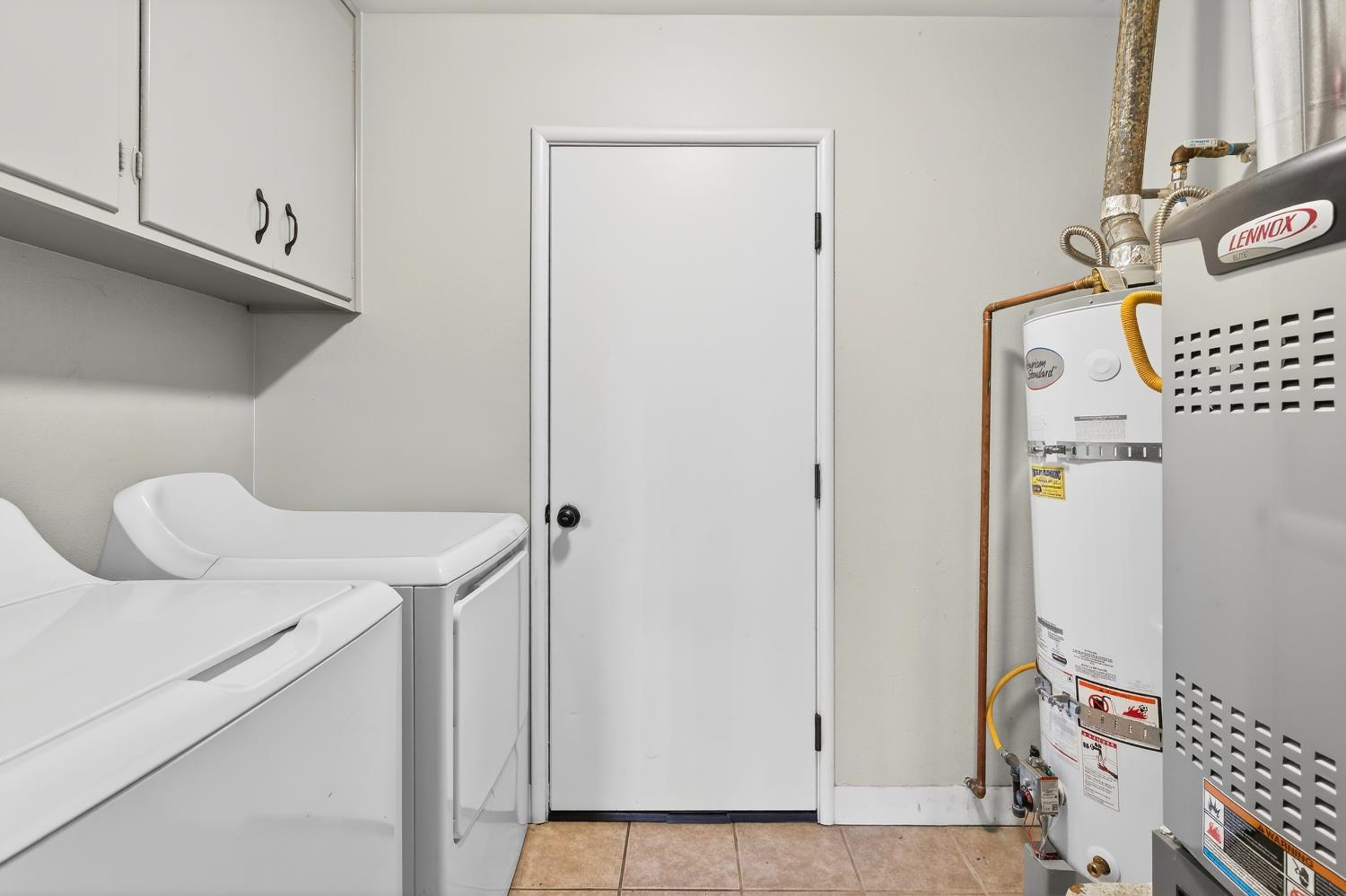 2337 Corbin Lane Lodi, CA 95242 - Photo 19 of 34 a bathroom with a sink a mirror and shower