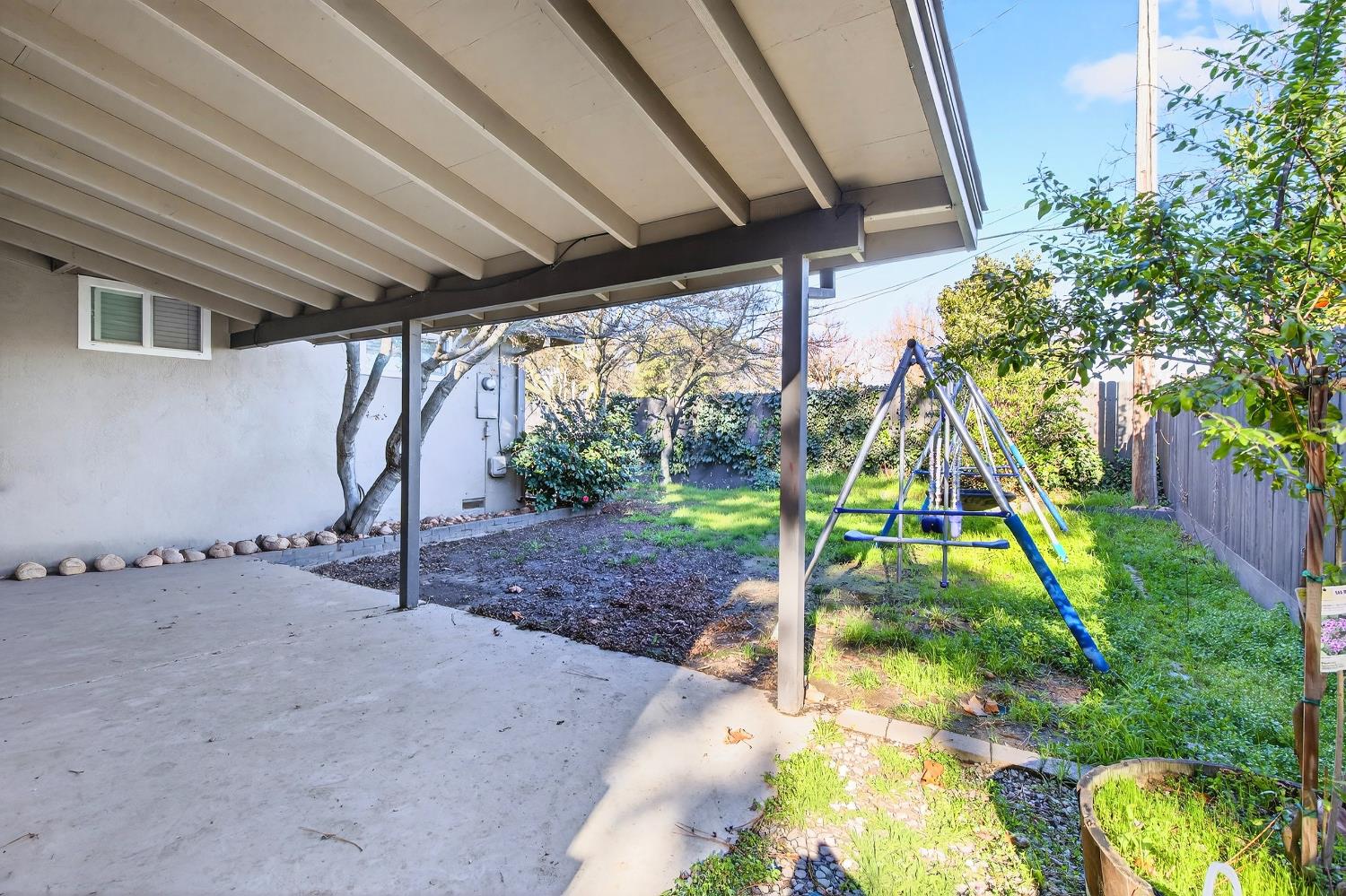 2337 Corbin Lane Lodi, CA 95242 - Photo 27 of 34 a view of a backyard with a table and chairs