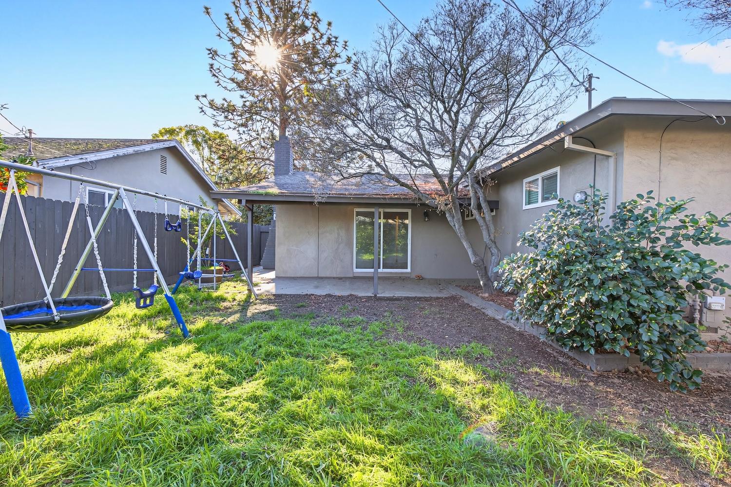 2337 Corbin Lane Lodi, CA 95242 - Photo 29 of 34 a view of a house with a yard patio and a slide