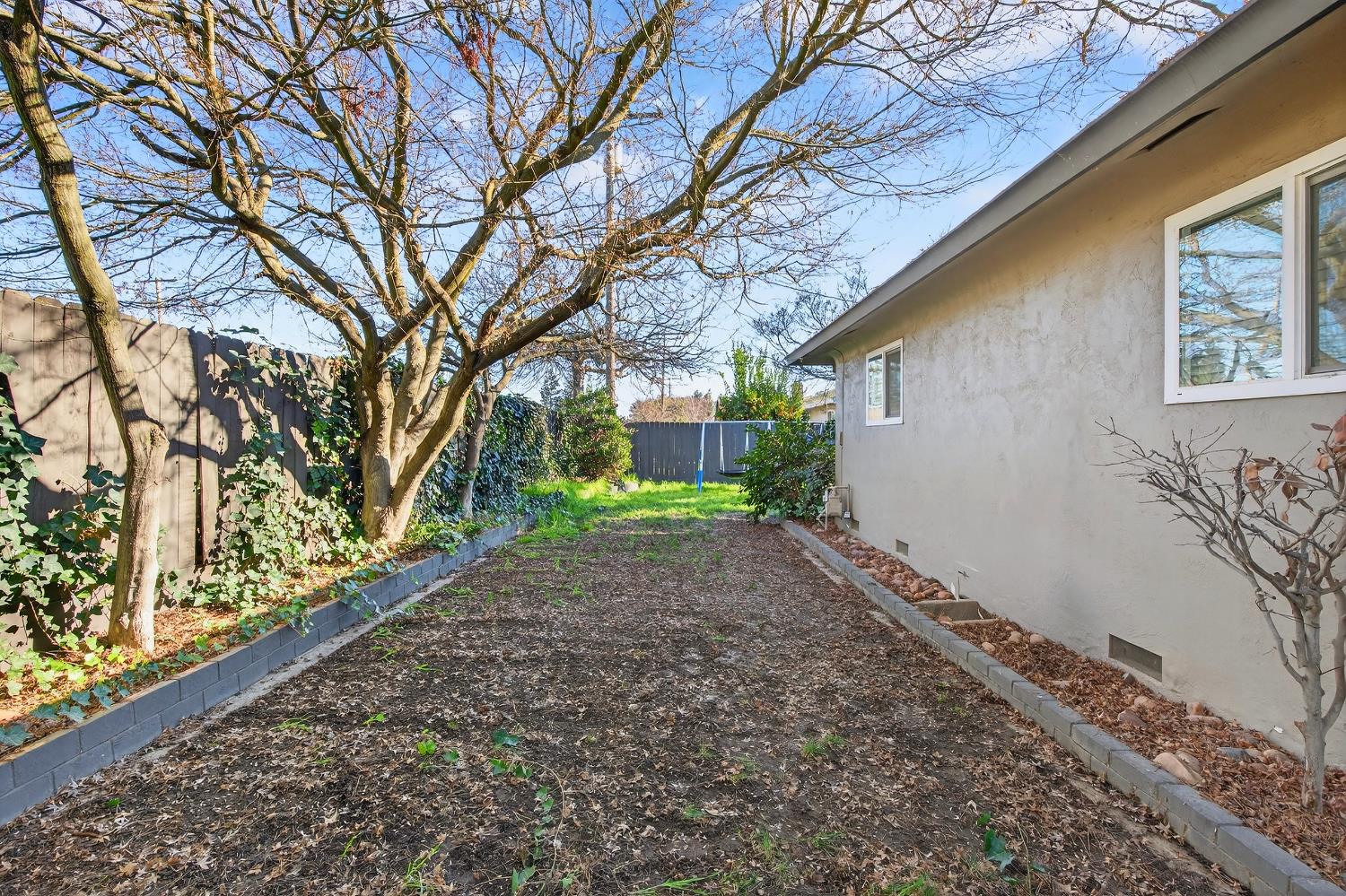 2337 Corbin Lane Lodi, CA 95242 - Photo 32 of 34 a backyard of a house with lots of green space