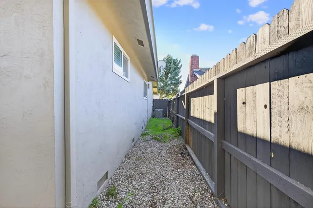 a view of a backyard with porch