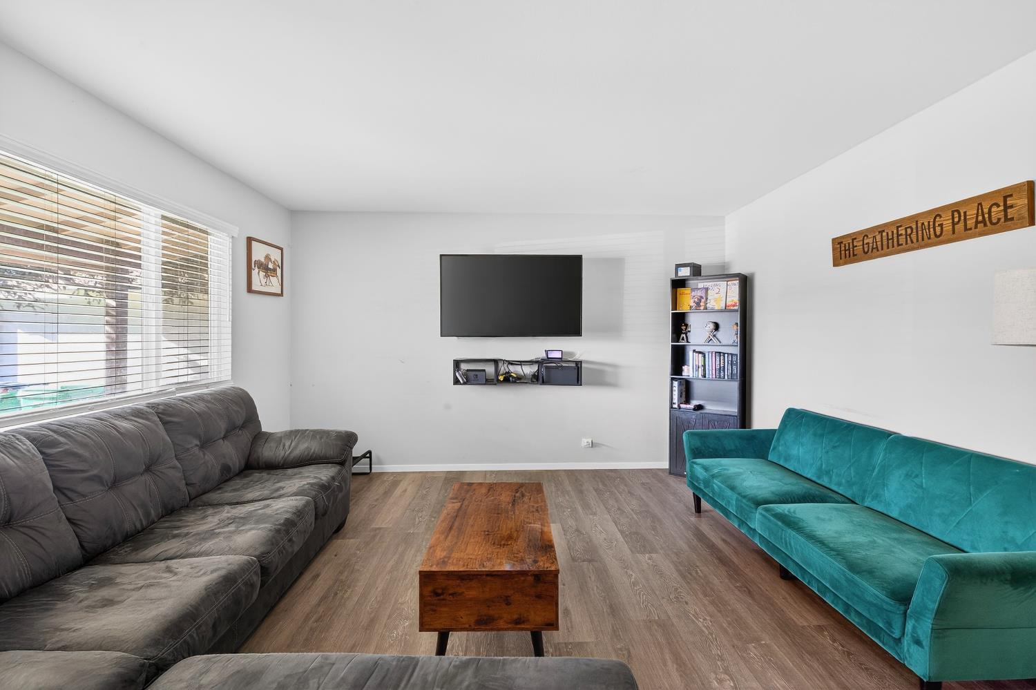 2337 Corbin Lane Lodi, CA 95242 - Photo 7 of 34 a living room with furniture and a flat screen tv