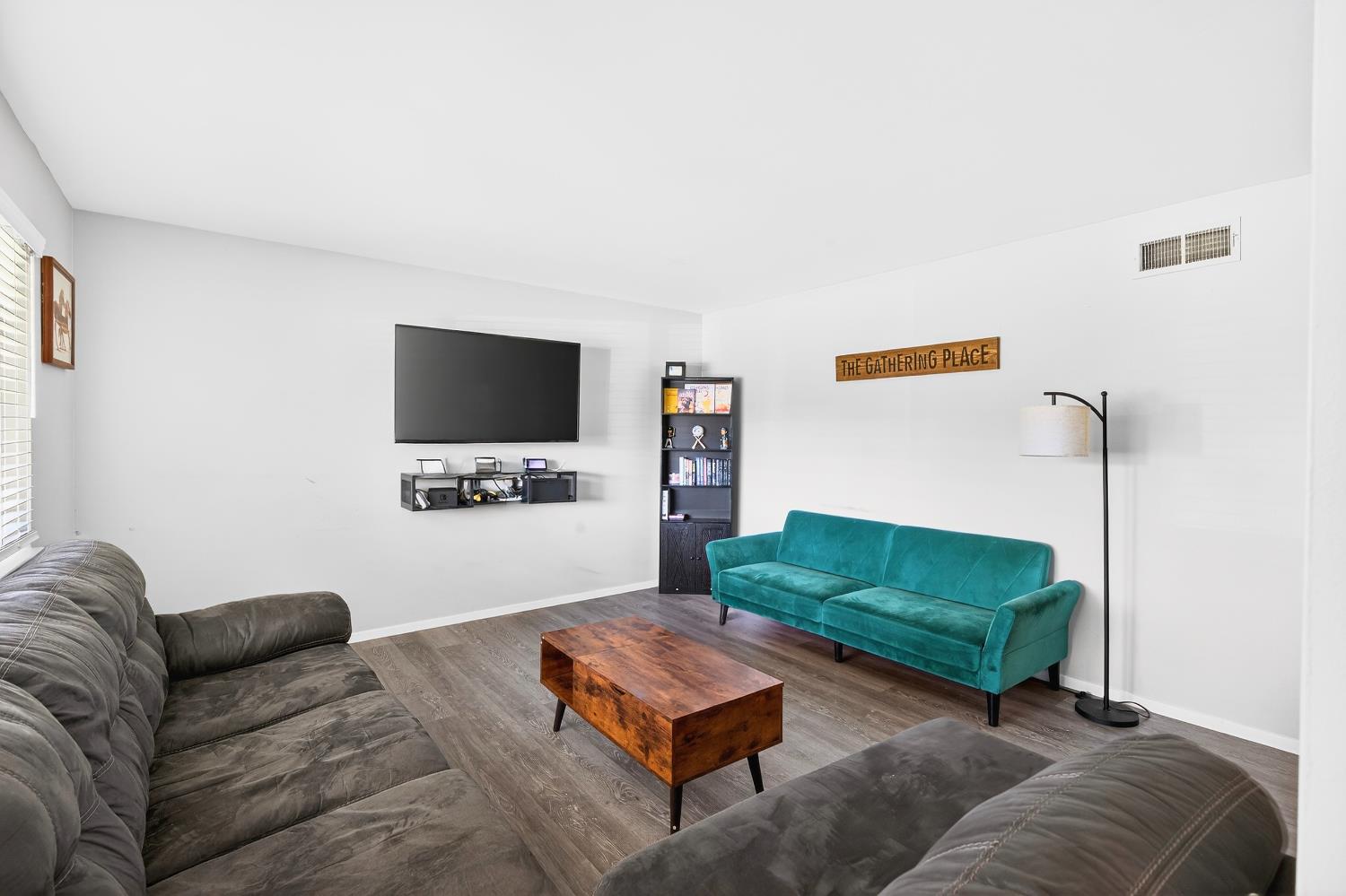 2337 Corbin Lane Lodi, CA 95242 - Photo 9 of 34 a living room with furniture and a flat screen tv