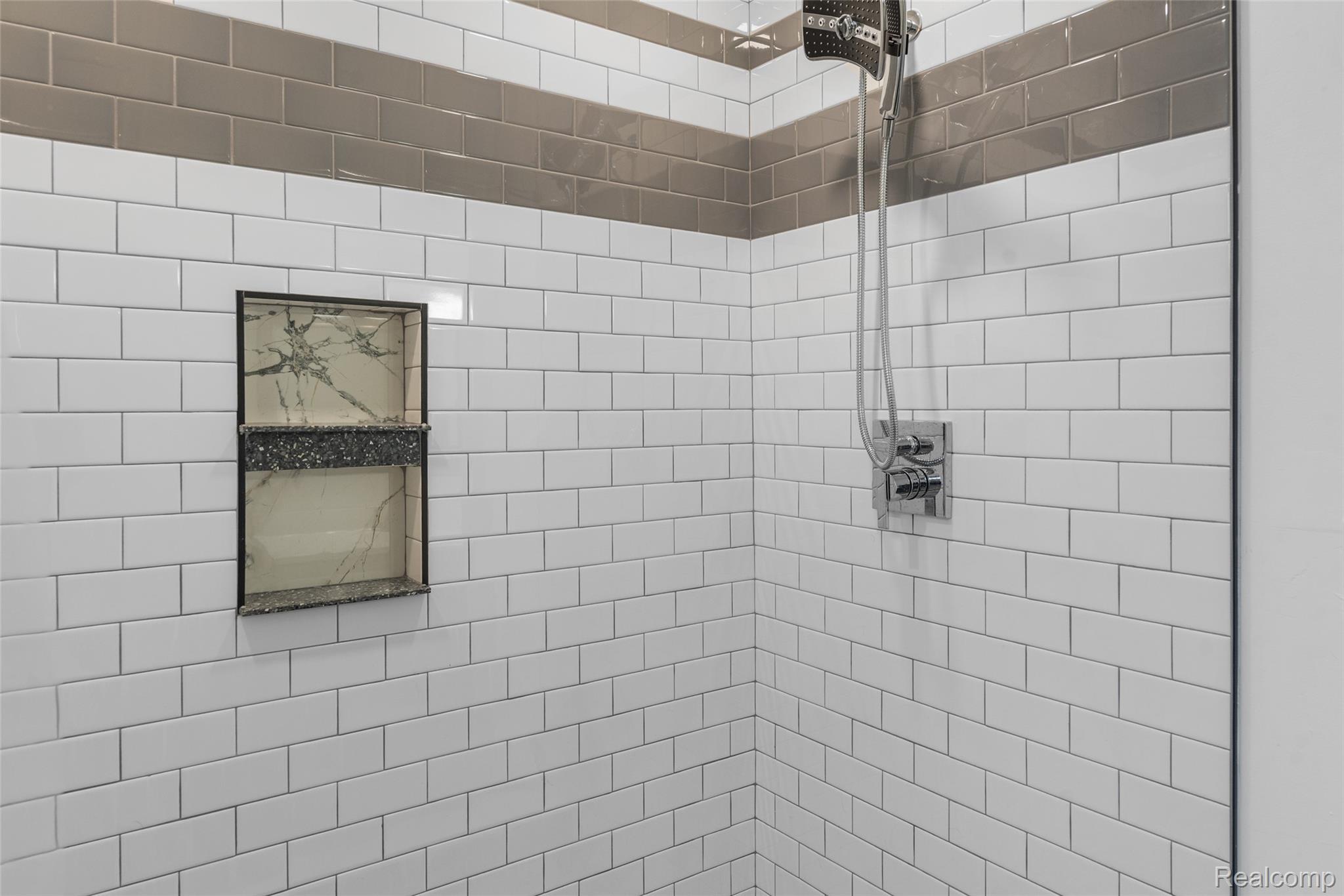 8150 Davison Road Davison, MI 48423 - Photo 12 of 25 Full bathroom featuring a tile shower