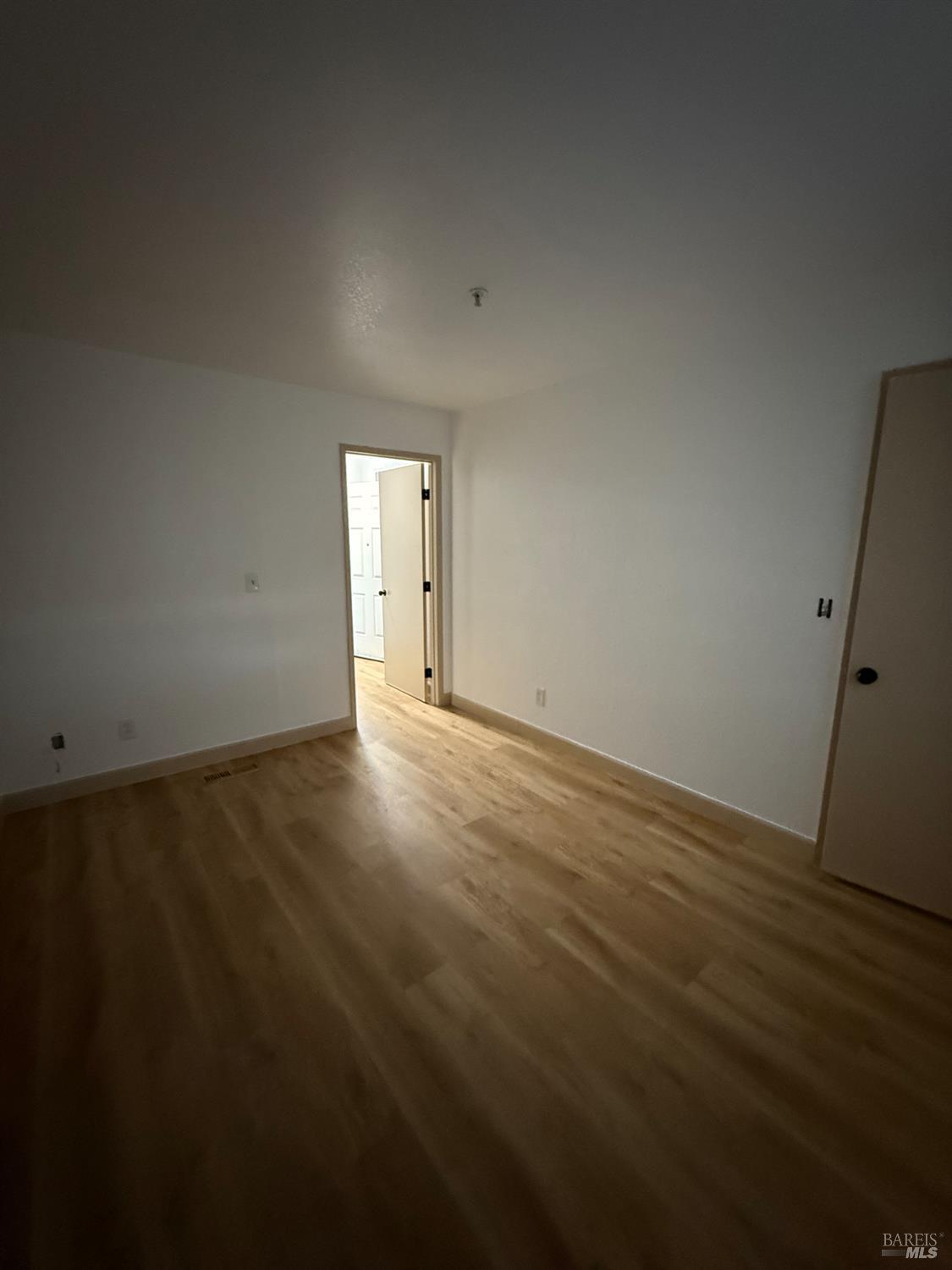 136 Sea Crest Circle Vallejo, CA 94590 - Photo 11 of 29 a view of an empty room and wooden floor