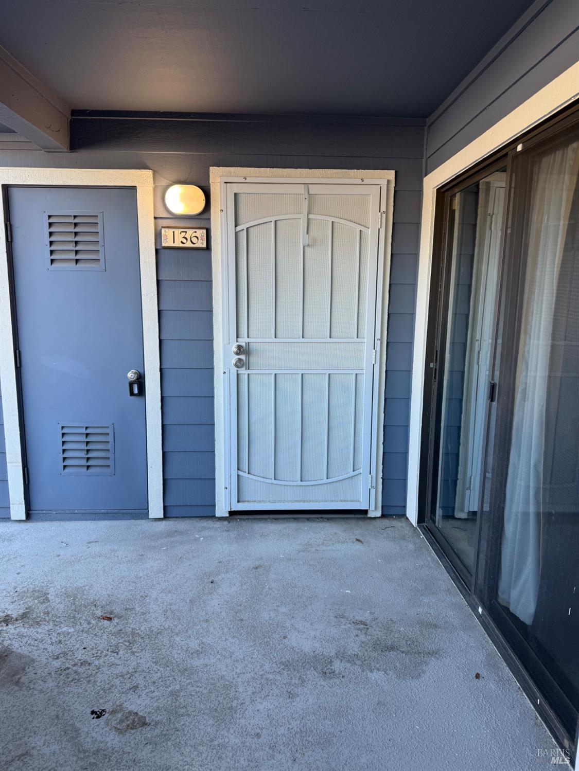 136 Sea Crest Circle Vallejo, CA 94590 - Photo 16 of 29 a view of an empty room with wooden floor and a window