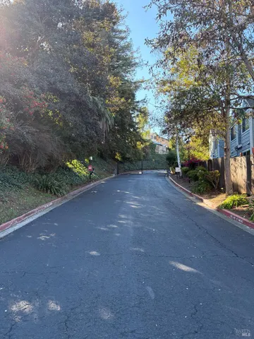 a front view of a house with a yard and a garage