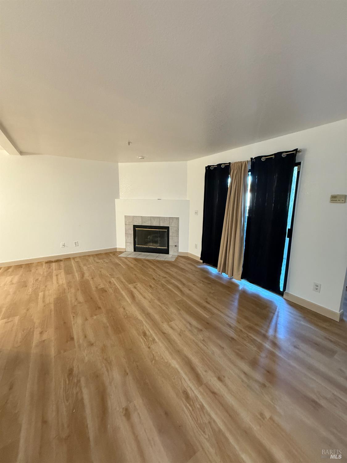 136 Sea Crest Circle Vallejo, CA 94590 - Photo 3 of 29 a view of empty room with wooden floor