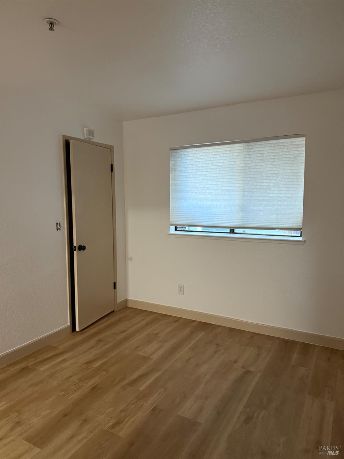136 Sea Crest Circle Vallejo, CA 94590 - Photo 10 of 29 a view of an empty room with wooden floor and closet