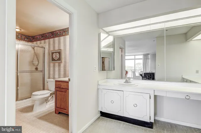 a bedroom with a bed and closet