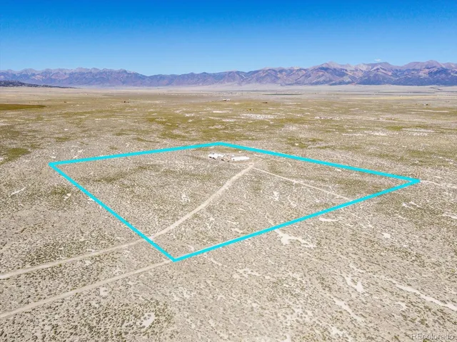 a view of an ocean and a mountain